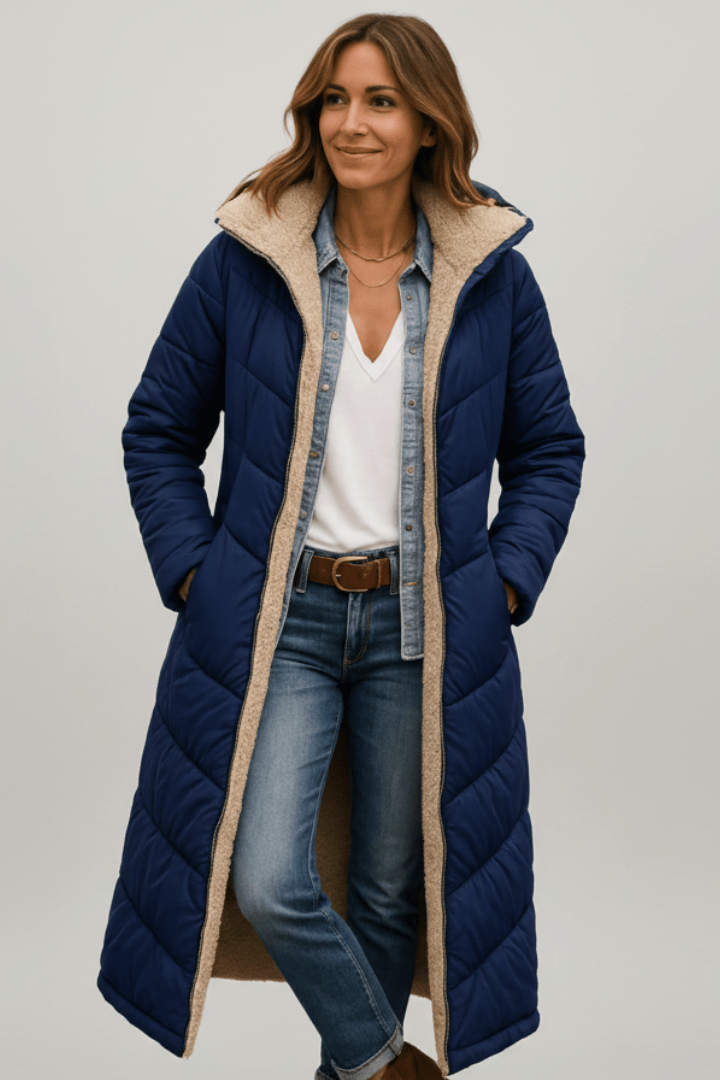 Navy blue hooded longline puffer coat, front on model