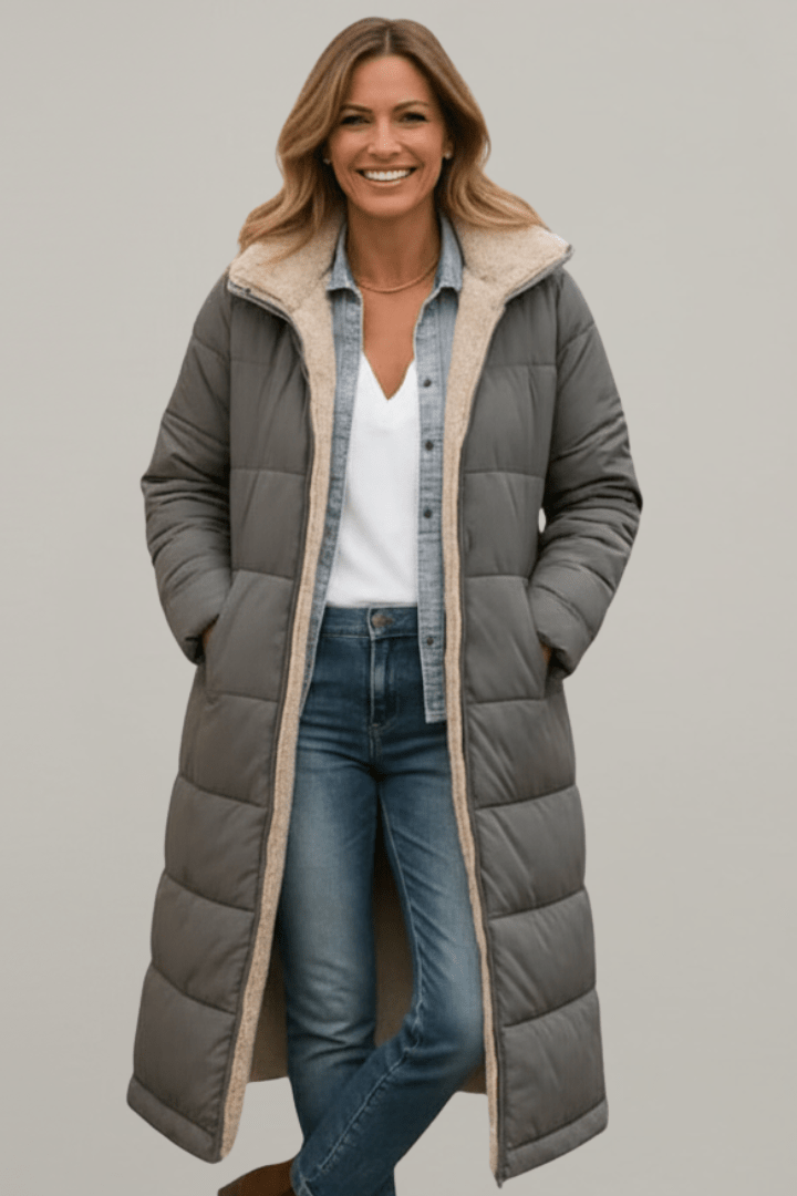 Grey hooded longline puffer coat, front on model