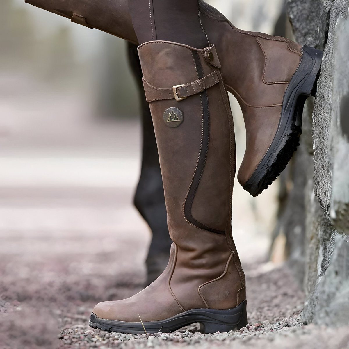Cataleya knee-high leather riding boots with buckle strap
