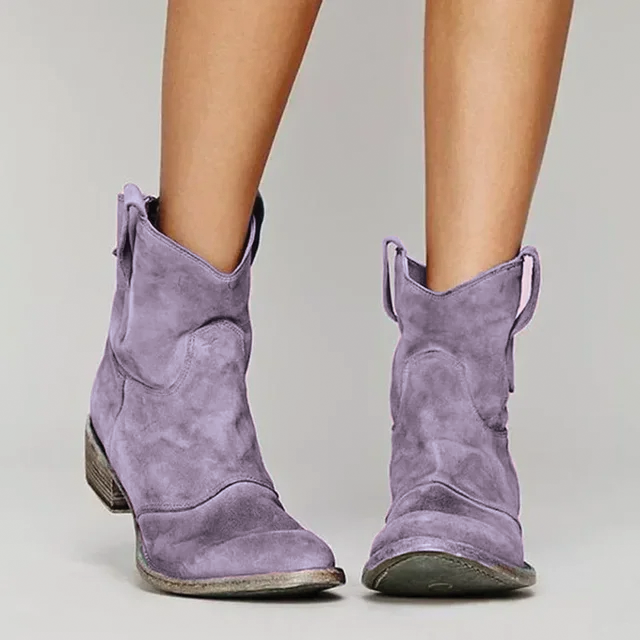 Lavender distressed western ankle boots, worn