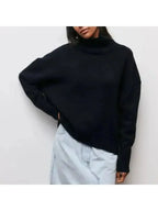 Pink oversized turtleneck knit sweater, front