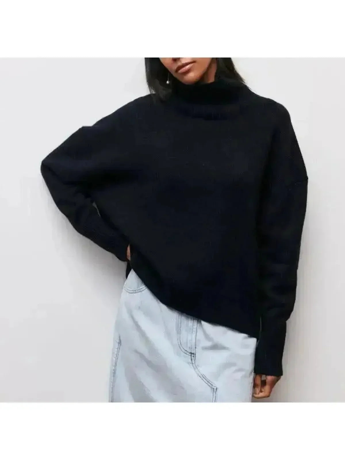 Pink oversized turtleneck knit sweater, front
