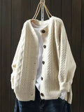 Beige oversized cable-knit button-down cardigan, front