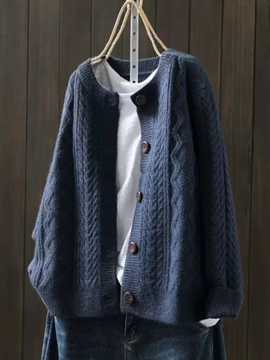 Navy blue oversized cable-knit cardigan, front
